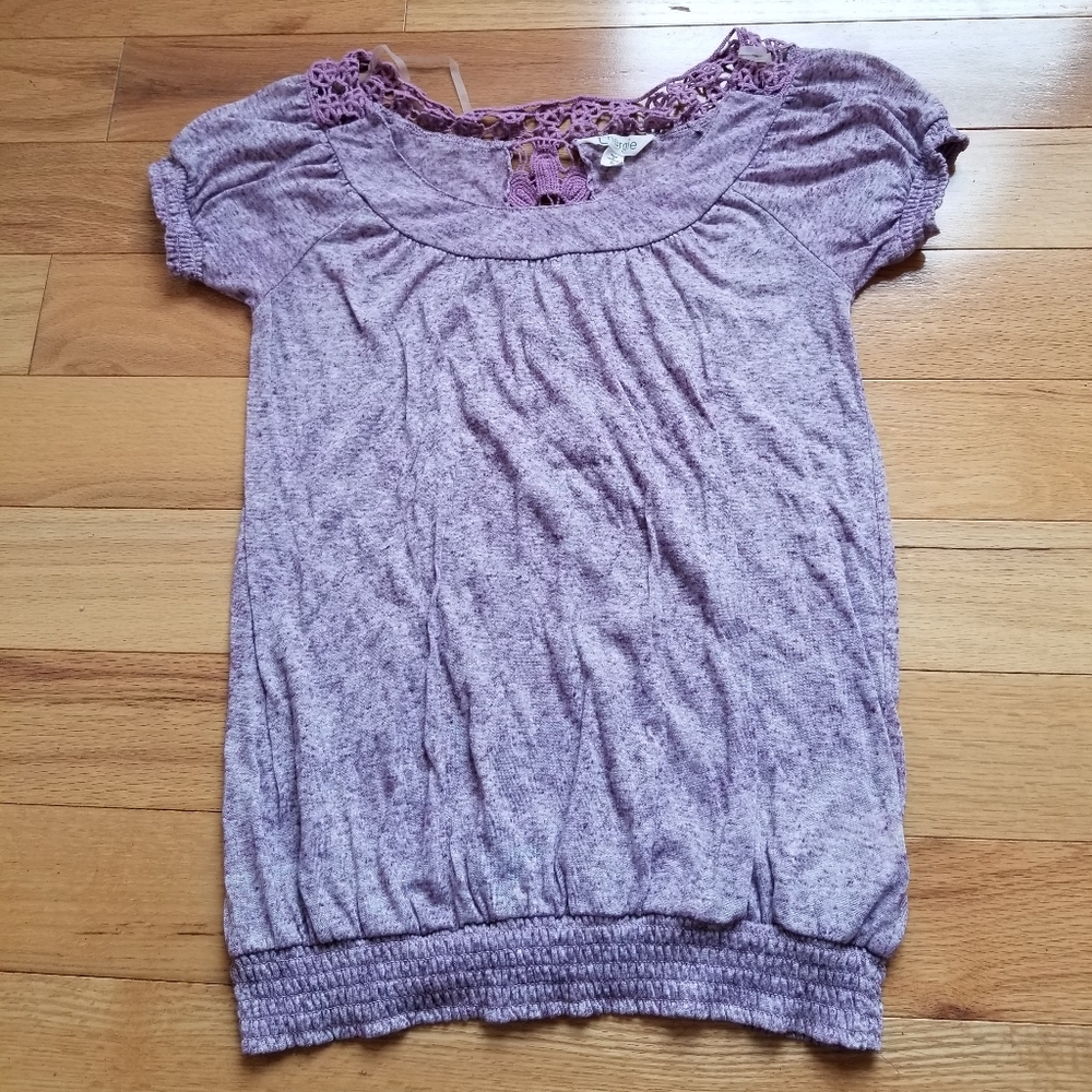 Energie short sleeved lace on the back shirt